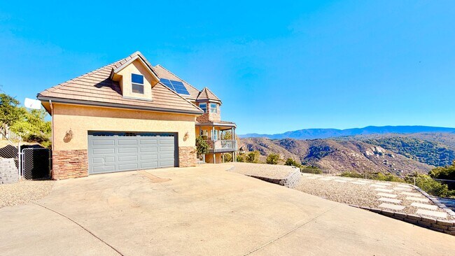 Building Photo - Spacious Two-Story Country Home with Amazing Views Looking out, and Privately Fenced and Gated Ya...