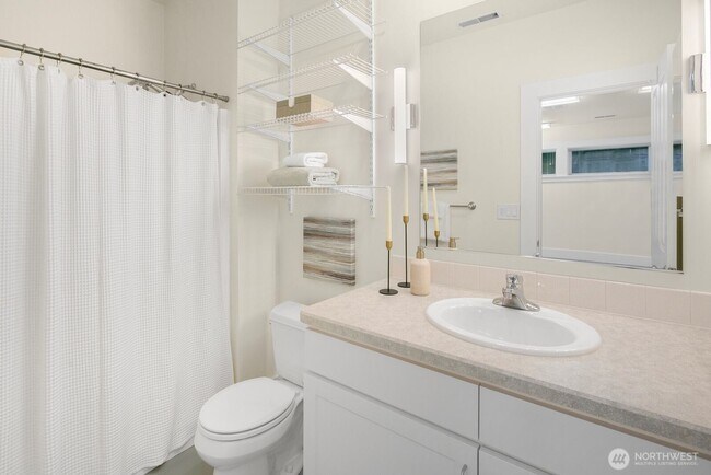 Building Photo - Light-Filled Magnolia Home with Spectacular Northwest Views