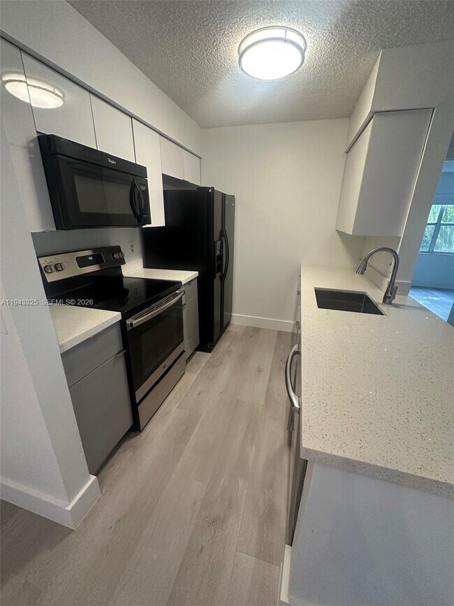 Building Photo - 10413 NW 7th St