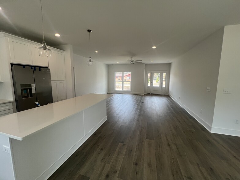 view into living room from kitchen/dining area - 132 Hargrove Dr