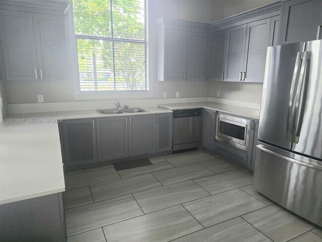 Building Photo - 9267 W 34th Ct