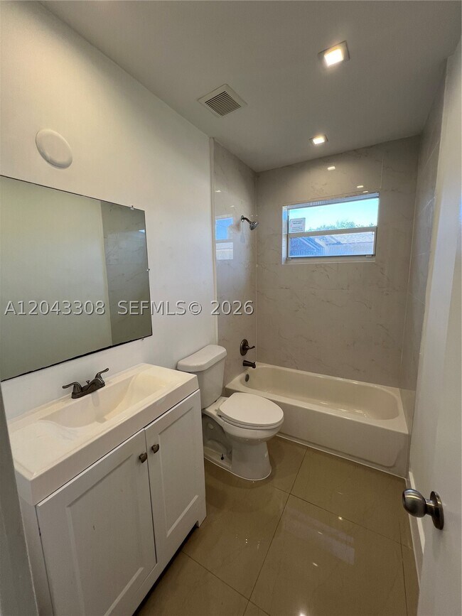 Building Photo - 8390 NW 15th Ave