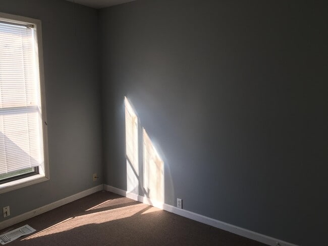 Building Photo - 105 E Texas Ave