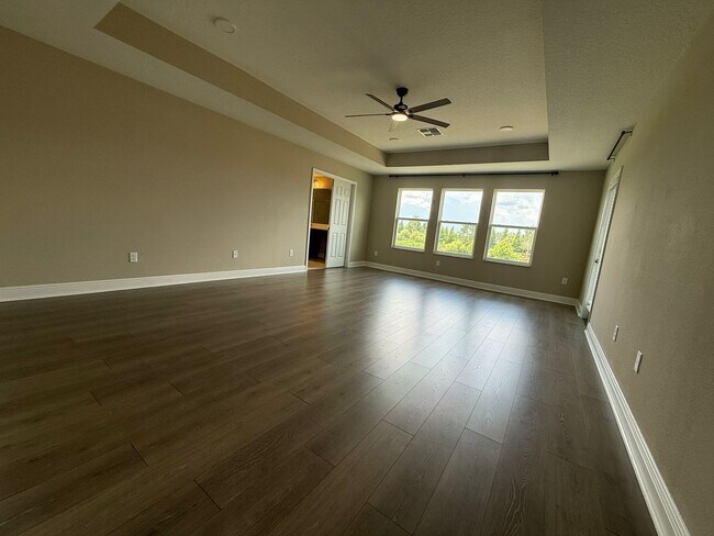 Building Photo - Brand-New 5BR/4BA Rental with Pond View, 4-Car Garage