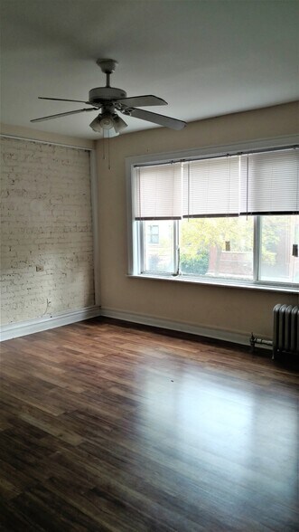 Building Photo - 6913 N Lakewood Ave