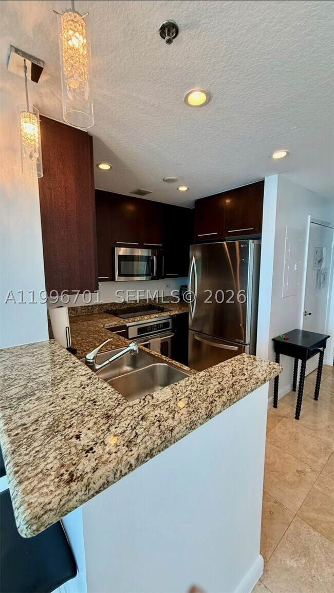 Building Photo - 6515 Collins Ave