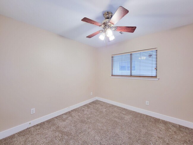 Building Photo - 3 bedroom one story home on large corner lot. Home has hard flooring throughout living areas and ...