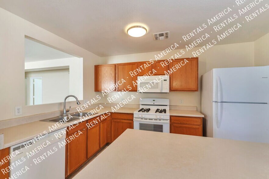 Building Photo - 8114 S Sunny Sky Pl