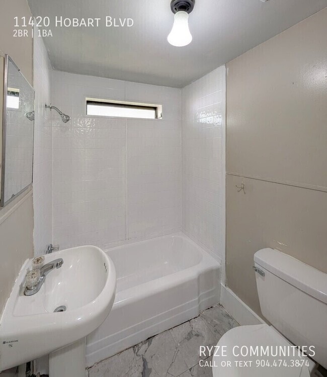 Building Photo - 11420 Hobart Blvd