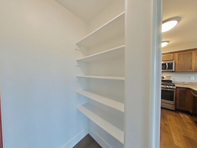 Building Photo - Stunning 3-bedroom, 2.5-bathroom condo with attached 2 stall garage!