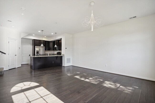 Building Photo - Stunning 2-Level Townhouse Condo in Sought...