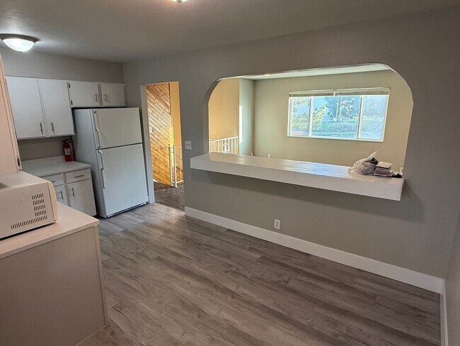 Building Photo - Upstairs Apartment Available-Two Bedroom, One Bath