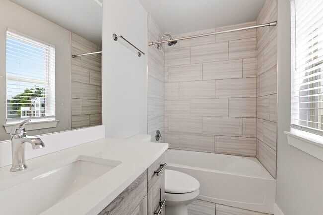 Building Photo - $2,890.95, 2-bed, 2.5-bath, located in Denver with a rooftop terrace.