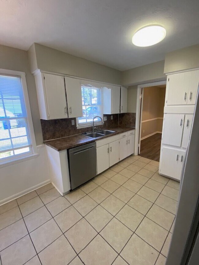 Building Photo - A Quiet Location, $200 Move-N-Special