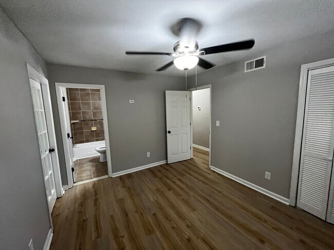 Building Photo - Must See the Sunroom off the Primary Bedroom!
