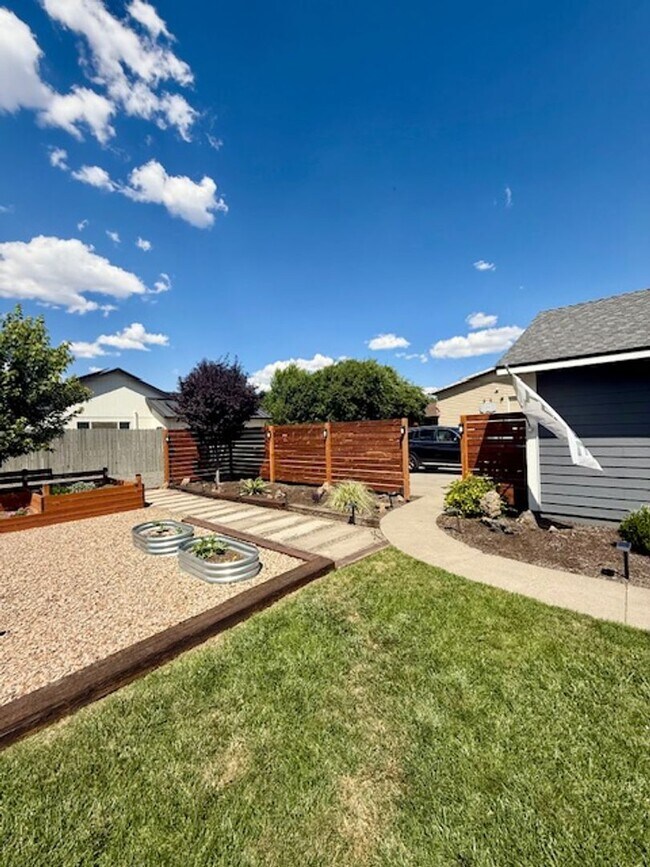 Building Photo - Serene Remodeled 4 Bedroom on Large Lot w/...