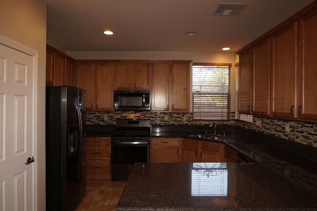 Building Photo - Beautiful Four Bedroom Home in Mountain`s Edge.