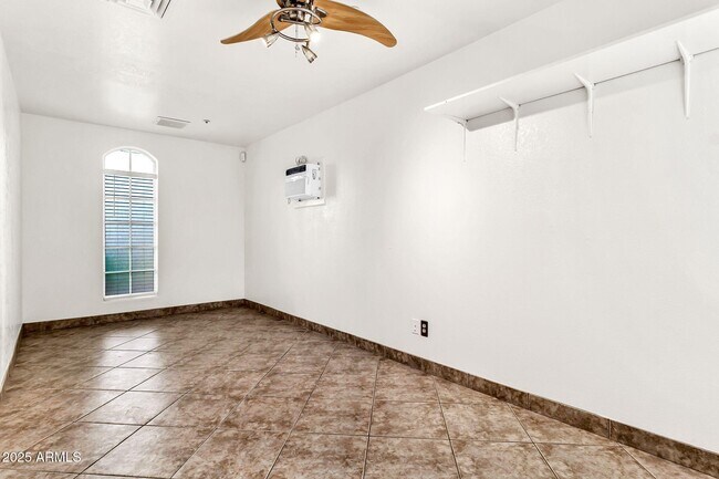 Building Photo - 9379 E Windrose Dr