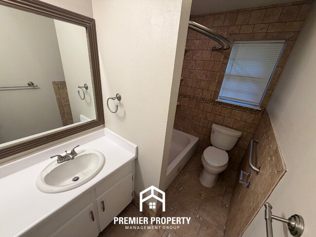 Building Photo - Charming 3BR/2BA Northport Home with Hardwood Floors & Brick Fireplace!