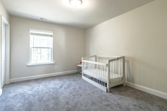 Building Photo - "Discover Spacious Living: 5-Bedroom Craftsman Home in Gated and Amenity-Rich Bretagne with Top-R...