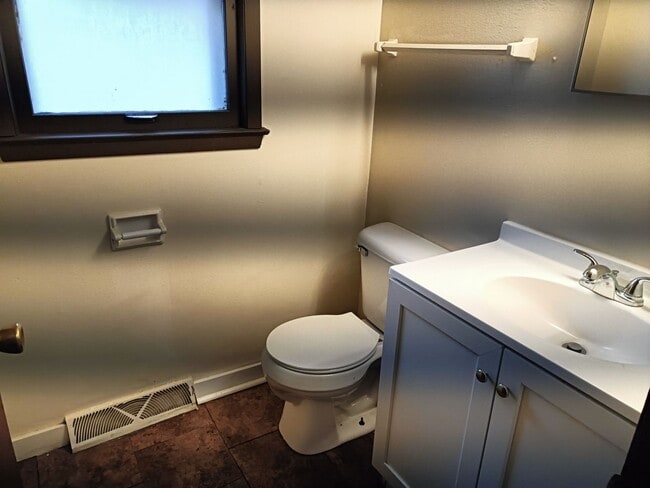 Building Photo - 7308-7312 W Mill Rd