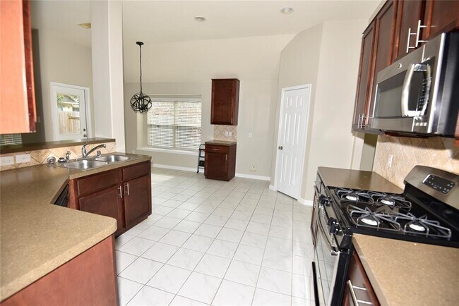 Building Photo - 9944 Western Ridge Way