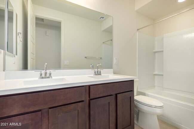 Building Photo - 8755 W Solano Dr