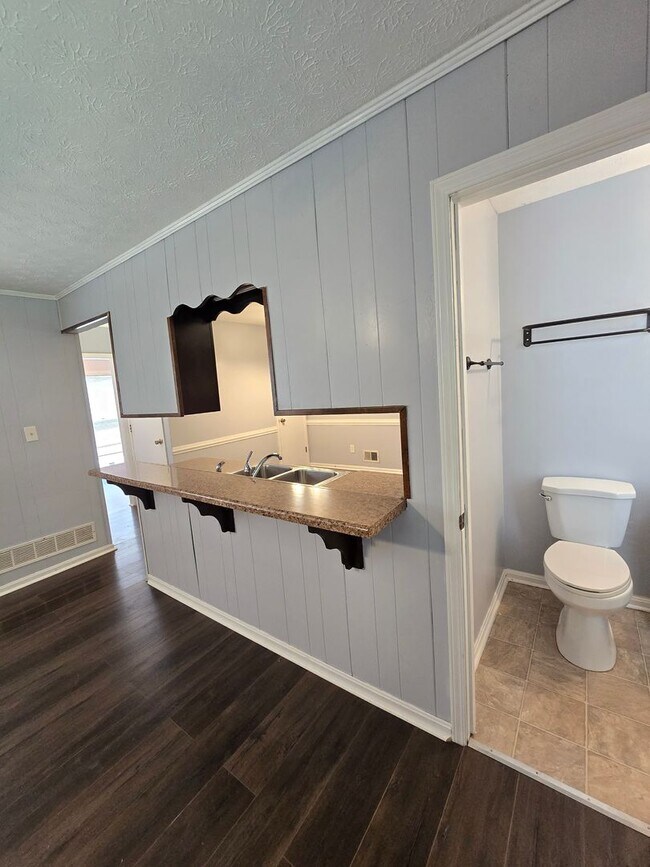 Building Photo - Brick Ranch in the heart of Jeffersontown! Featuring hardwood styled floors, 3 Bedrooms, 1.5 Bath...