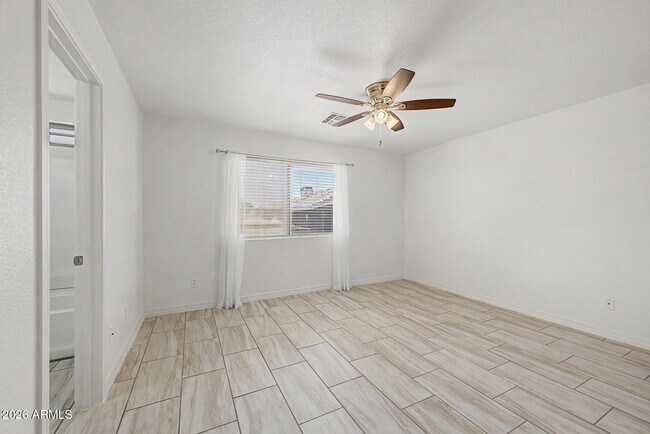 Building Photo - 8563 W Mission Ln