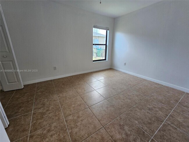 Building Photo - 3820 SW 16th Pl