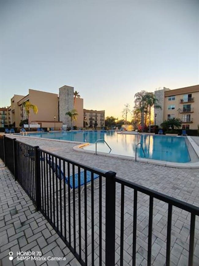 Building Photo - Welcome to Tampa Racquet Club – Where Comfort Meets Convenience!