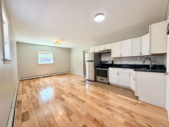 Building Photo - Move in July 1st • Spacious 1BR w/ Bonus Room Open Layout • Assigned Parking • Appliances • Garfield