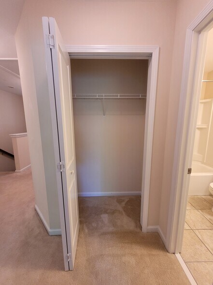 Linen Closet across from bedrooms beside hall bath - 2496 Stadium Dr