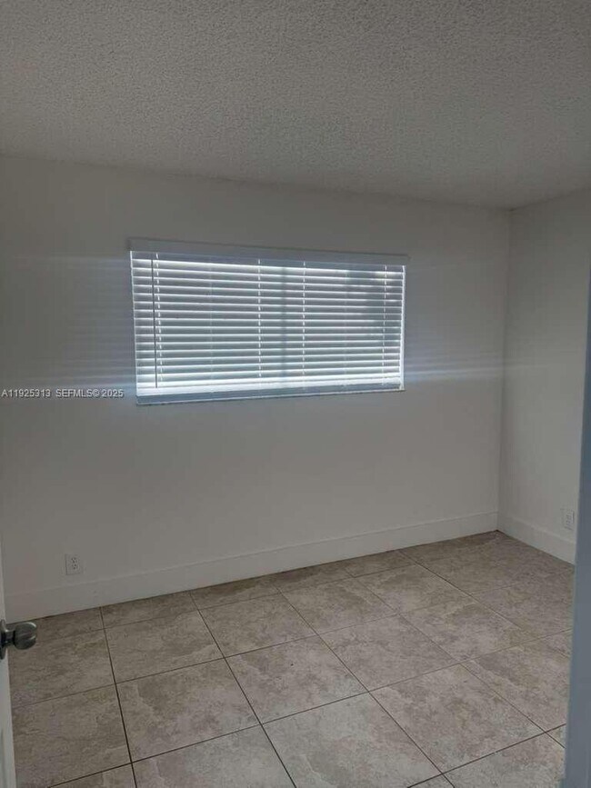 Building Photo - 8700 N Sherman Cir