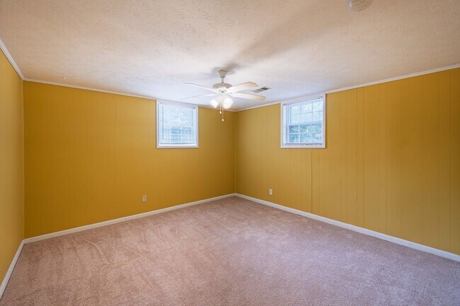 Building Photo - Updated 5BR Home in Morrow with New Carpet and Spacious Yard