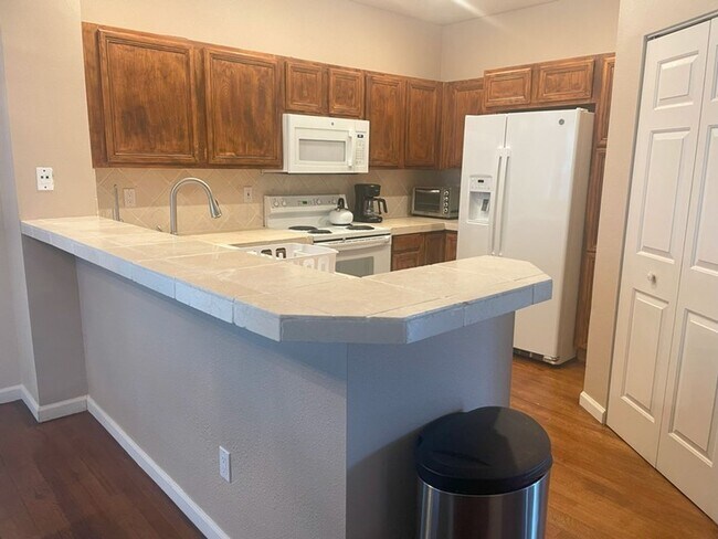 Building Photo - Furnished Two Bedroom Two Bathroom Caughlin Ranch Home