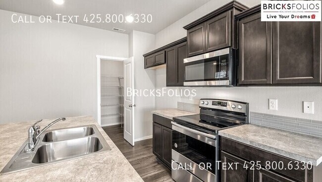Building Photo - Your Dream Home in Puyallup – Where Peace ...