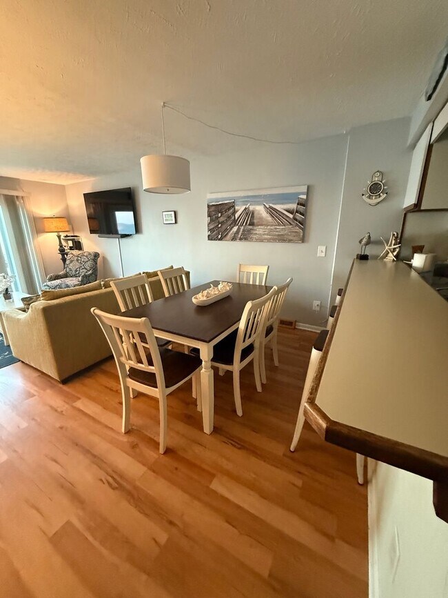 Building Photo - NEW OWNERS OF THIS FURNSIHED OFF-SEASON RE...