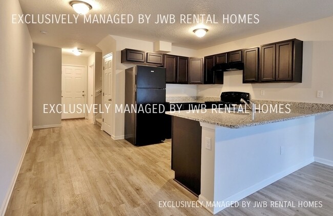 Building Photo - 8476 McGirts Village Ln