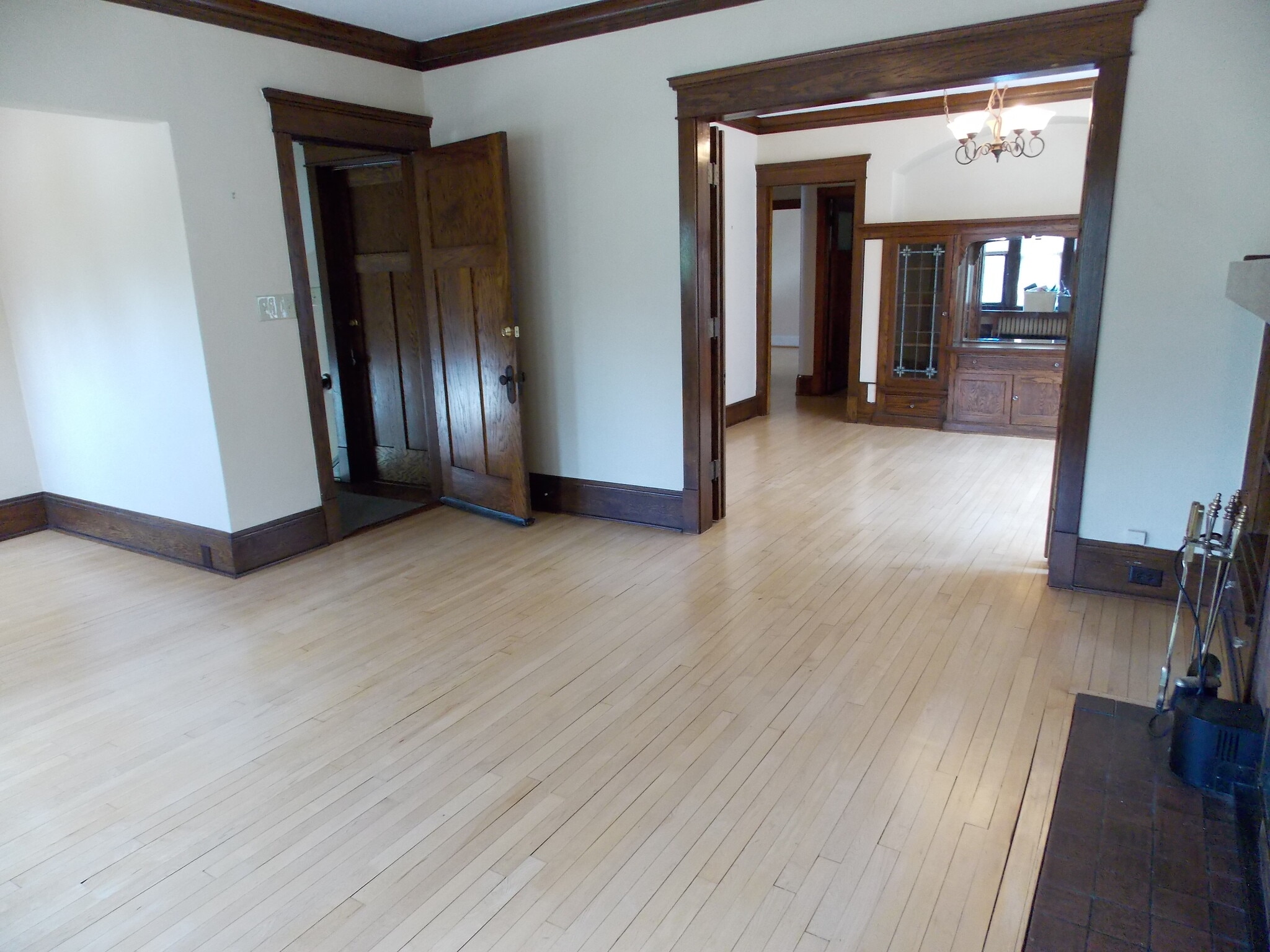 LR toward entry and leaded glass buffet - 3408 N Downer Ave