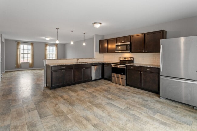 Building Photo - COMING SOON! Spacious 4-Bed Grand Blanc Home with Modern Comfort