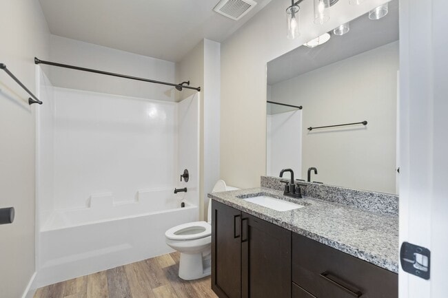 Building Photo - AMMON 3 BED 2 BATH TOWNHOME WITH 2 STALL G...