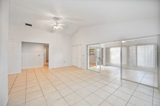 Building Photo - Beautiful Must See!! 3/2 Plus Sunroom & Garage!!  Gated Community!!