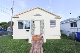 Building Photo - 6393 NW 17th Ave