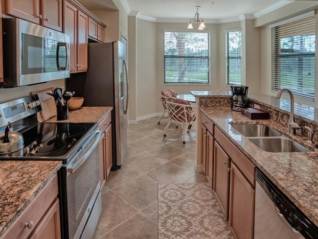 Building Photo - 2BR/2BA Annual Furnished First Floor Condo available in Treviso Bay for immediate occupancy with ...