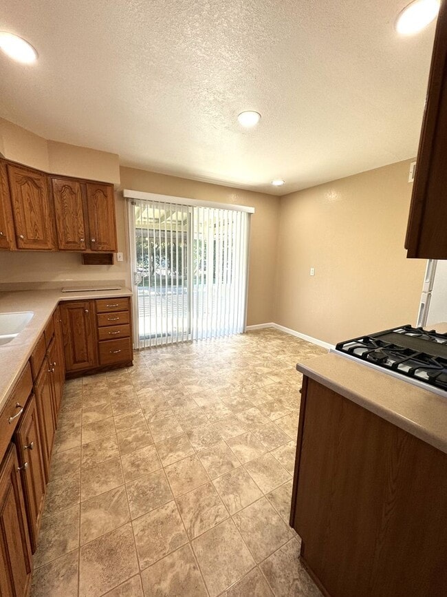 Building Photo - 3-Bedroom Home with Spacious Backyard Available to move in April 1