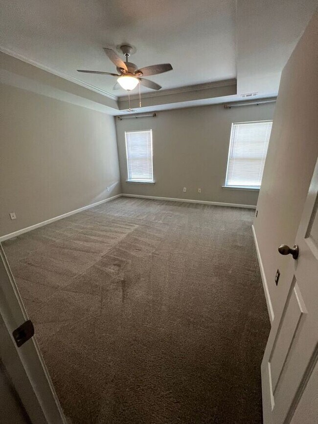 Building Photo - Spacious 2-Bedroom Townhome with Finished Studio Suite – Prime Location!