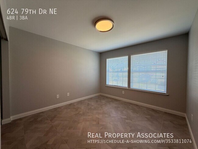 Building Photo - 624 79th Dr NE