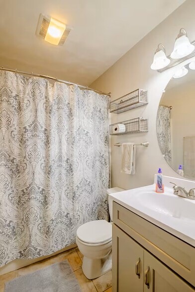 Updated vanity and lighting. - 515 School Ln