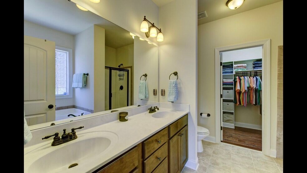 Owner's Bath + walk in closet - 1359 Micahs Way N